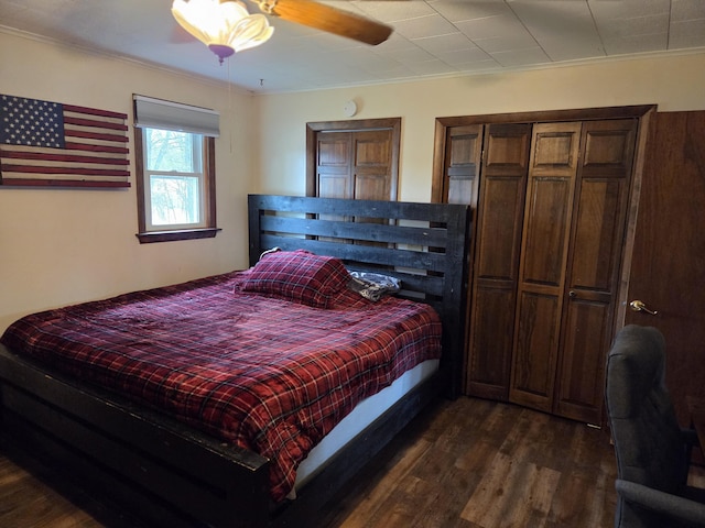 134 Minuteman Dr, Millinocket, ME 04462 - bedroom featuring dark wood-style floors, crown molding, and ceiling fan
