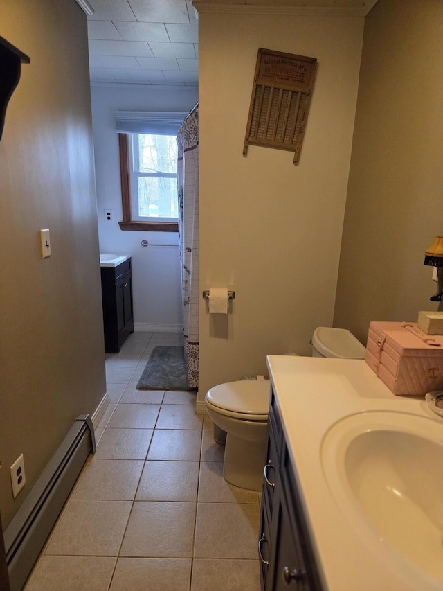 134 Minuteman Dr, Millinocket, ME 04462 - bathroom with baseboard heating, toilet, tile patterned flooring, vanity, and a shower with shower curtain