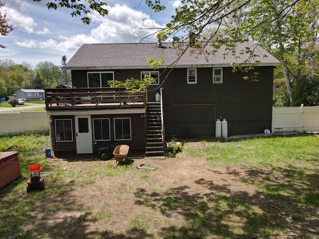 134 Minuteman Dr, Millinocket, ME 04462 - rear view of property featuring stairs, a deck, and roof with shingles