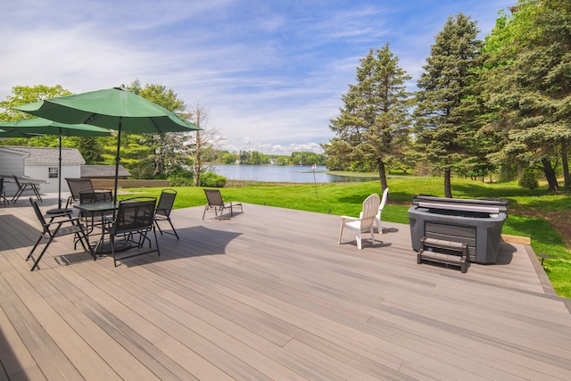 18 Trafton Ln, Kittery, ME 03904 - wooden terrace featuring a water view, outdoor dining space, and a lawn