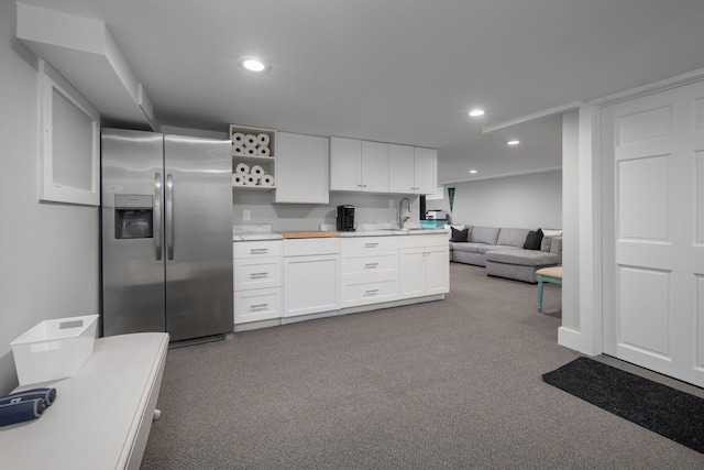 18 Trafton Ln, Kittery, ME 03904 - kitchen with stainless steel fridge with ice dispenser, carpet floors, light countertops, white cabinets, and recessed lighting