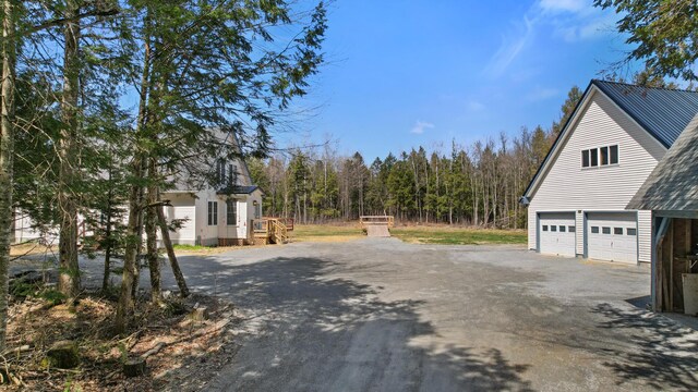573 Exeter Rd, Corinth, ME 04427 - view of asphalt driveway