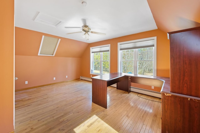 573 Exeter Rd, Corinth, ME 04427 - unfurnished office featuring a baseboard radiator, light wood-style flooring, a ceiling fan, vaulted ceiling, and attic access