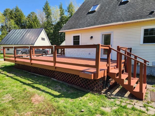 573 Exeter Rd, Corinth, ME 04427 - deck featuring a lawn