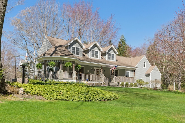 view of front of house featuring a porch and a front yard