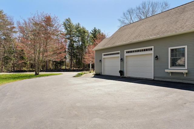 garage with driveway