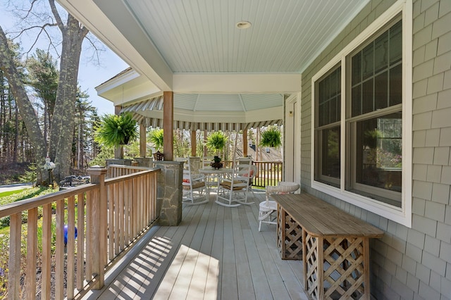 deck with covered porch