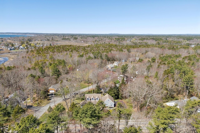 bird's eye view featuring a wooded view
