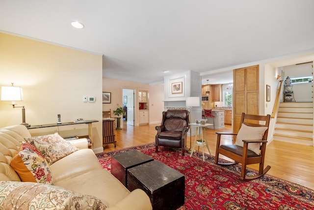 59 Beach Ave, Kennebunk, ME 04043 - living room featuring light wood-style flooring, stairs, healthy amount of natural light, and recessed lighting