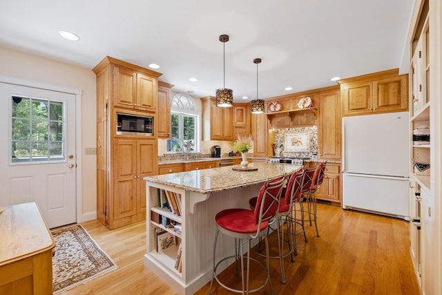 59 Beach Ave, Kennebunk, ME 04043 - kitchen featuring freestanding refrigerator, open shelves, black microwave, healthy amount of natural light, and recessed lighting