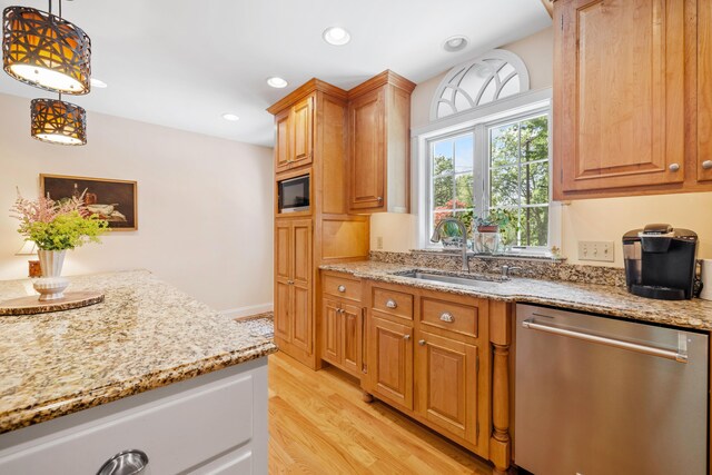 59 Beach Ave, Kennebunk, ME 04043 - kitchen featuring dishwasher, light wood-style flooring, light stone countertops, decorative light fixtures, and black microwave