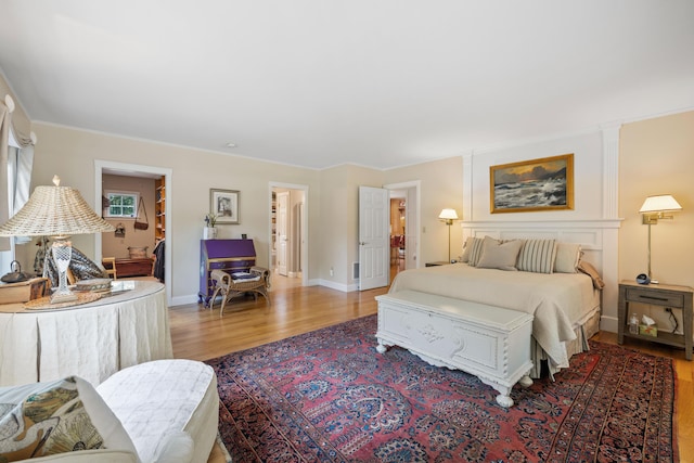 59 Beach Ave, Kennebunk, ME 04043 - bedroom with wood finished floors and ornamental molding