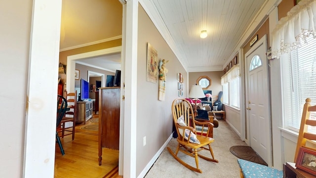 150 Enfield Rd, Lincoln, ME 04457 - corridor featuring crown molding, wood finished floors, and baseboards