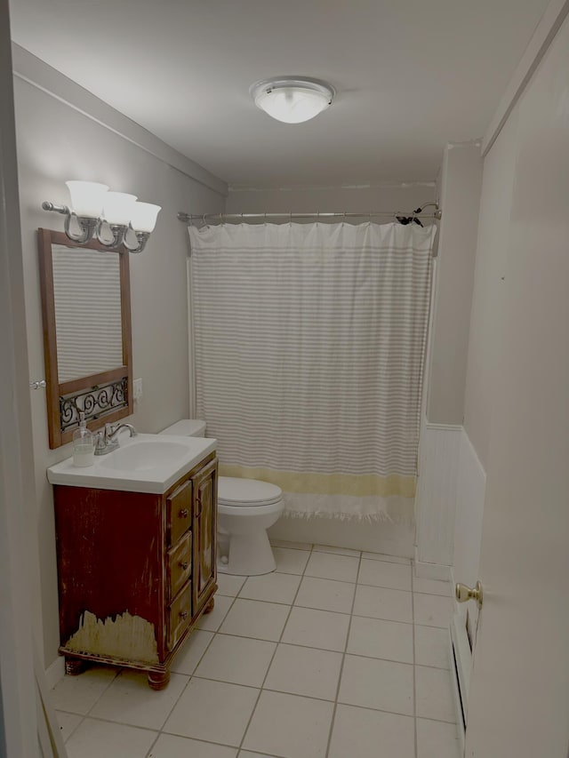 980 Dover Rd, Dexter, ME 04930 - bathroom featuring vanity, toilet, and tile patterned flooring