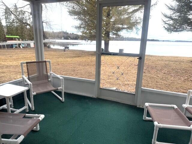 160 Pinkhams Cove Rd, Belgrade, ME 04917 - unfurnished sunroom featuring a water view