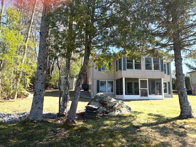 160 Pinkhams Cove Rd, Belgrade, ME 04917 - back of property with a lawn and a sunroom