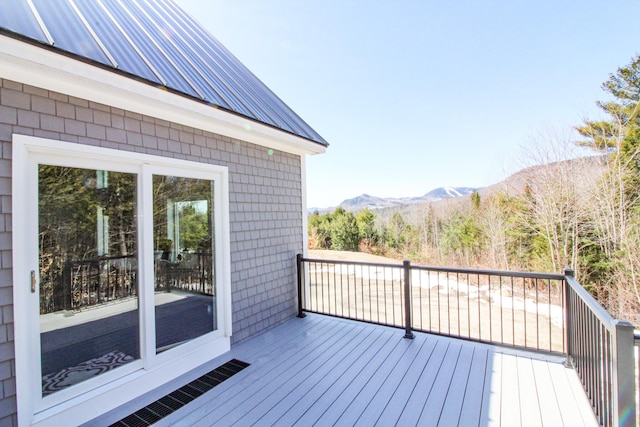 28 First St, Bethel, ME 04217 - wooden terrace with a mountain view