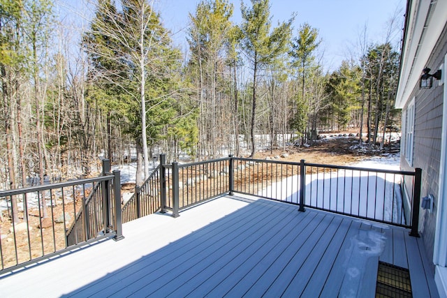28 First St, Bethel, ME 04217 - wooden terrace featuring a forest view