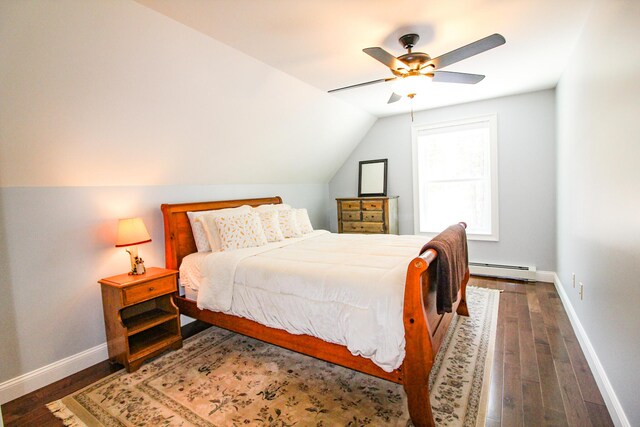 28 First St, Bethel, ME 04217 - bedroom with baseboard heating, wood finished floors, baseboards, and lofted ceiling