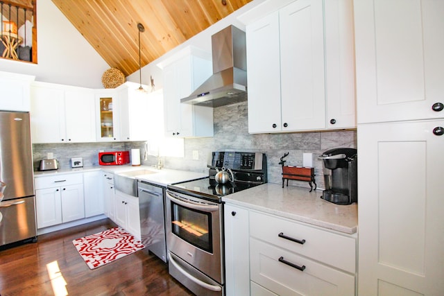 28 First St, Bethel, ME 04217 - kitchen featuring stainless steel appliances, wall chimney range hood, wooden ceiling, vaulted ceiling, and dark wood-type flooring