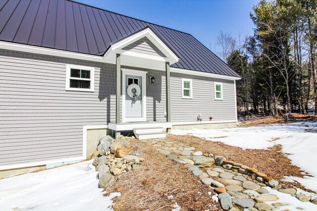 28 First St, Bethel, ME 04217 - view of front of house featuring metal roof