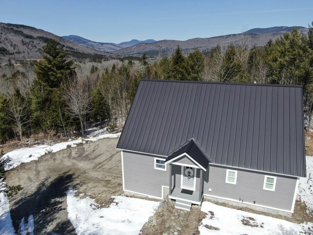 28 First St, Bethel, ME 04217 - view of front facade with metal roof