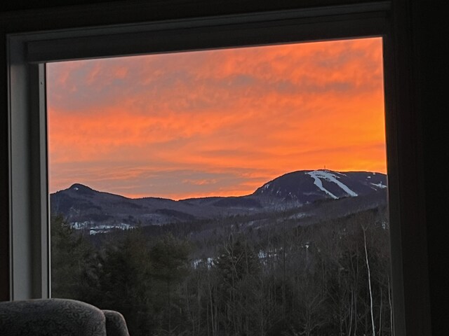 28 First St, Bethel, ME 04217 - view of mountain backdrop with a forest