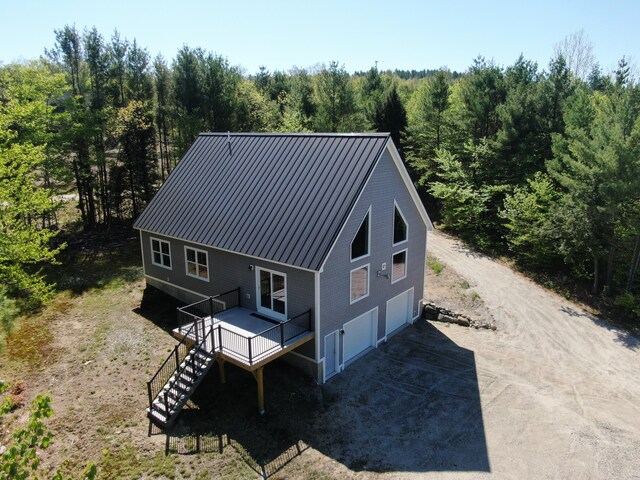 28 First St, Bethel, ME 04217 - view of subject property with a forest