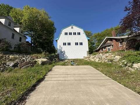 239 Penobscot St, Rumford, ME 04276 - view of front of house featuring a gambrel roof