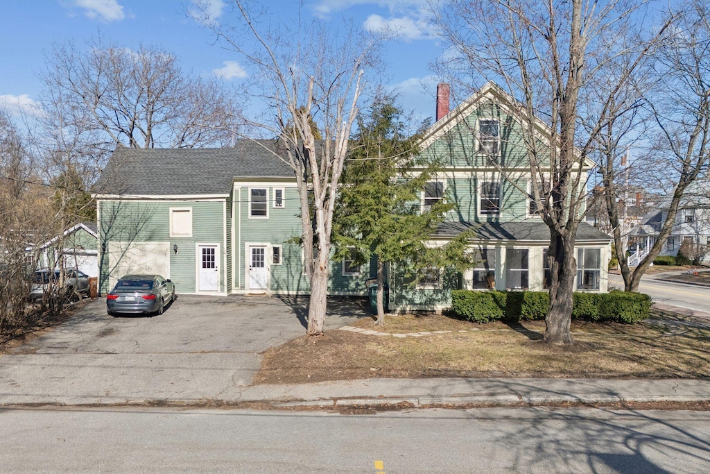 112 Elm St, Saco, ME 04072 - view of front of property featuring a chimney