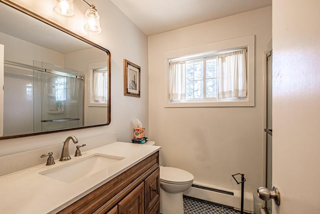 full bath featuring an enclosed shower, vanity, a baseboard radiator, tile patterned floors, and toilet