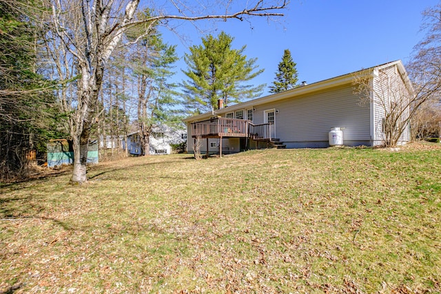 view of yard with a wooden deck