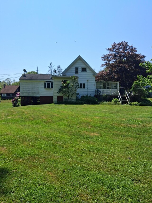 67 Huddle Rd, Bristol, ME 04554 - back of property featuring a lawn