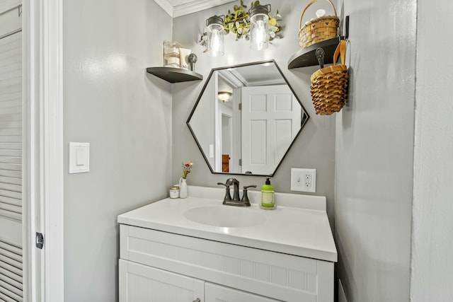 834 Main St, Bradley, ME 04411 - bathroom featuring crown molding and vanity