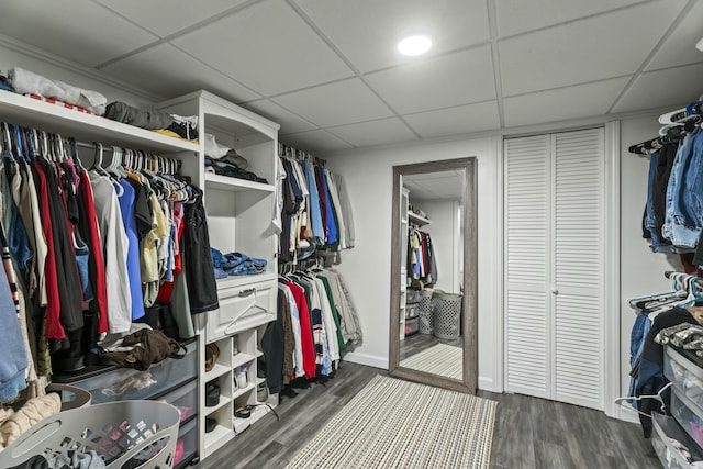 834 Main St, Bradley, ME 04411 - spacious closet featuring dark wood-type flooring and a paneled ceiling