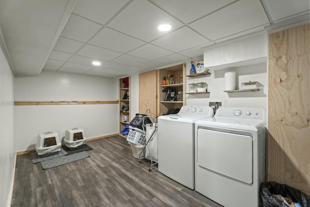834 Main St, Bradley, ME 04411 - clothes washing area featuring washing machine and dryer, baseboards, laundry area, and wood finished floors