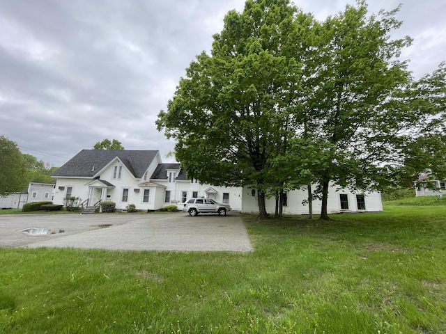 132 E Main St, Dover-Foxcroft, ME 04426 - view of front of property with a front lawn