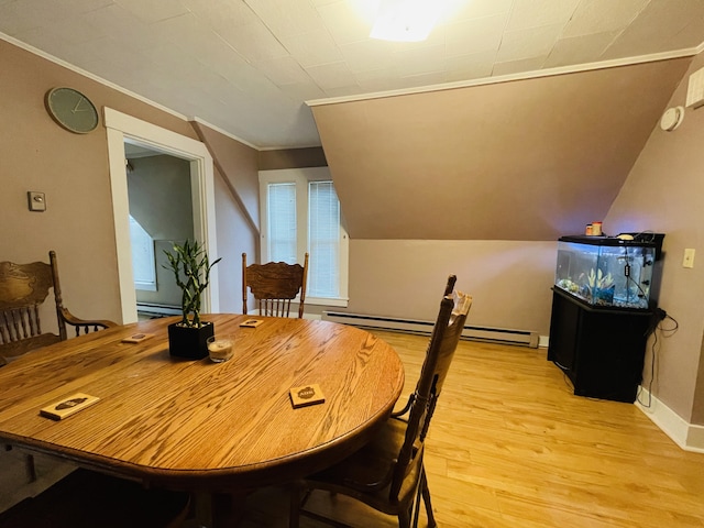 132 E Main St, Dover-Foxcroft, ME 04426 - dining space with light wood-type flooring, baseboard heating, and ornamental molding