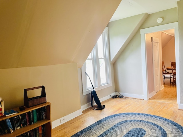 132 E Main St, Dover-Foxcroft, ME 04426 - additional living space featuring vaulted ceiling, wood finished floors, and baseboards
