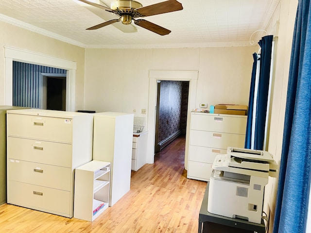 132 E Main St, Dover-Foxcroft, ME 04426 - bedroom featuring crown molding, light wood-style flooring, refrigerator, and ceiling fan