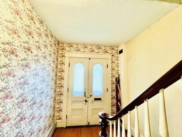 132 E Main St, Dover-Foxcroft, ME 04426 - foyer featuring wood finished floors and wallpapered walls