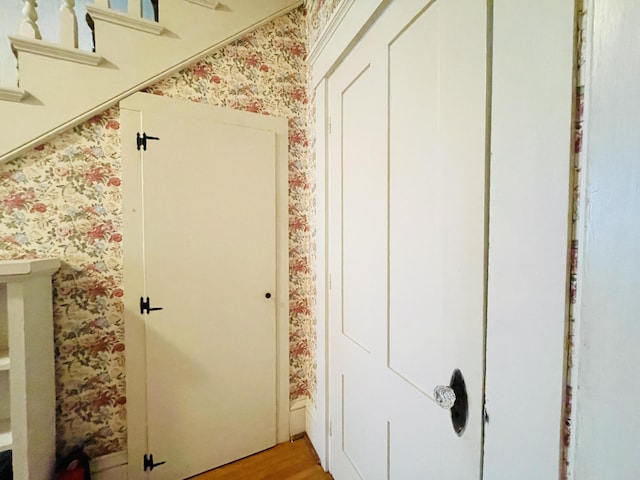 132 E Main St, Dover-Foxcroft, ME 04426 - bathroom featuring wallpapered walls and wood finished floors