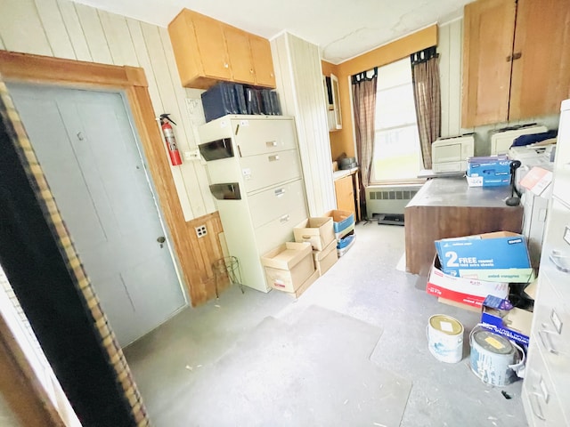 132 E Main St, Dover-Foxcroft, ME 04426 - kitchen with radiator and concrete floors