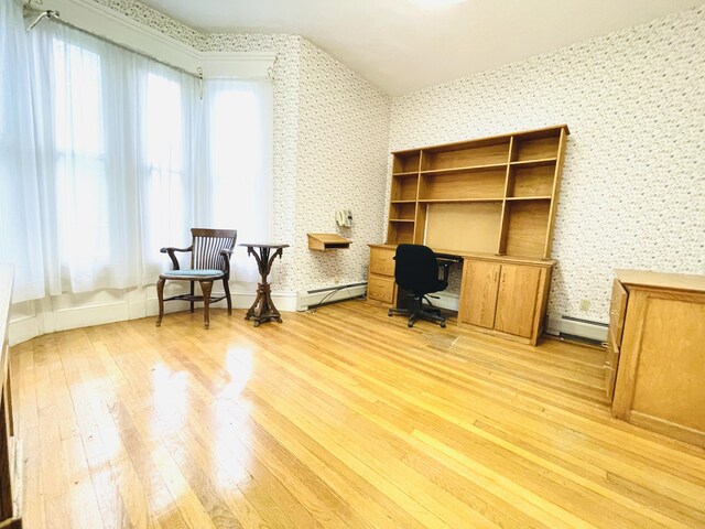 132 E Main St, Dover-Foxcroft, ME 04426 - home office with light wood-style flooring, wallpapered walls, and baseboard heating