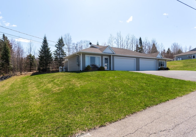 308 19th Ave Unit 101, Madawaska, ME 04756 - ranch-style house with an attached garage, asphalt driveway, and a front yard