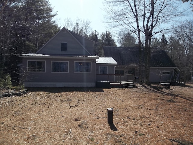 8 Varney Loop, Crawford, ME 04694 - back of house with a deck and metal roof