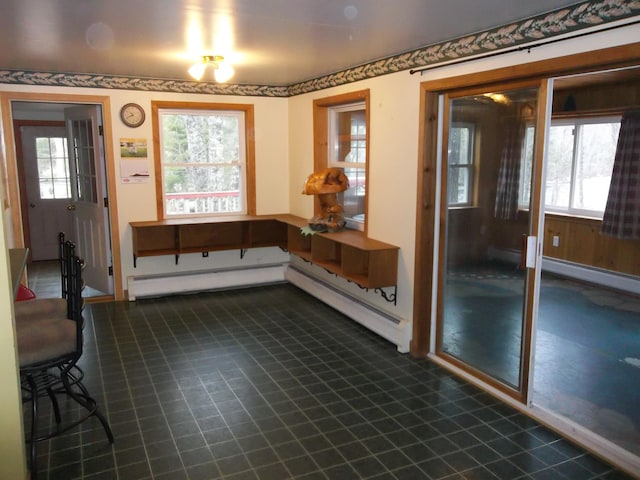 8 Varney Loop, Crawford, ME 04694 - interior space featuring a baseboard radiator, dark floors, baseboards, and a baseboard heating unit