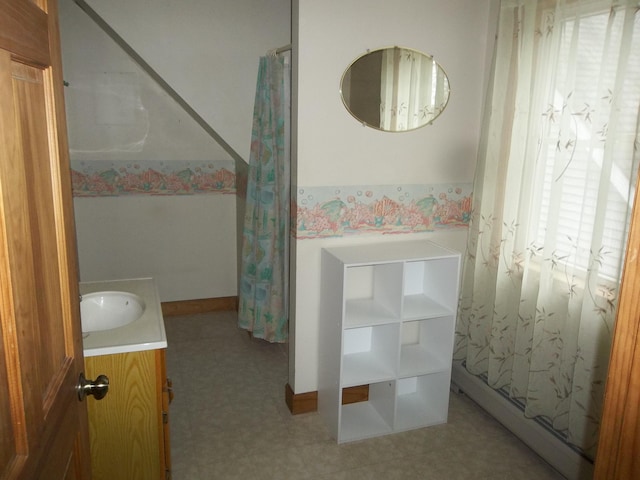 8 Varney Loop, Crawford, ME 04694 - full bathroom with vanity, a baseboard radiator, and tile patterned floors
