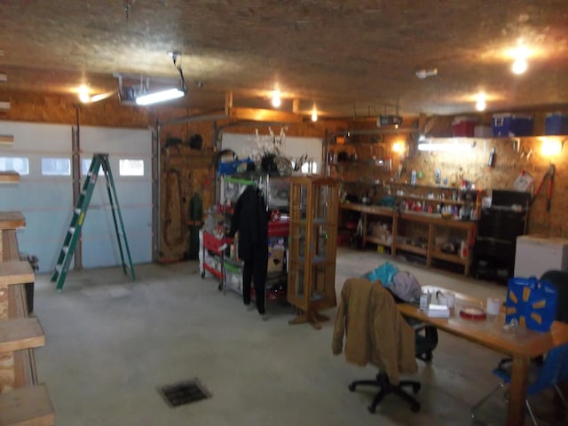 8 Varney Loop, Crawford, ME 04694 - garage featuring a workshop area and visible vents