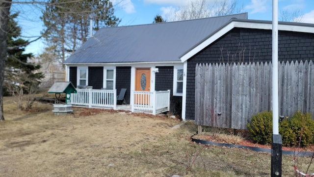 5 Johnson St, Eastport, ME 04631 - view of front facade featuring metal roof